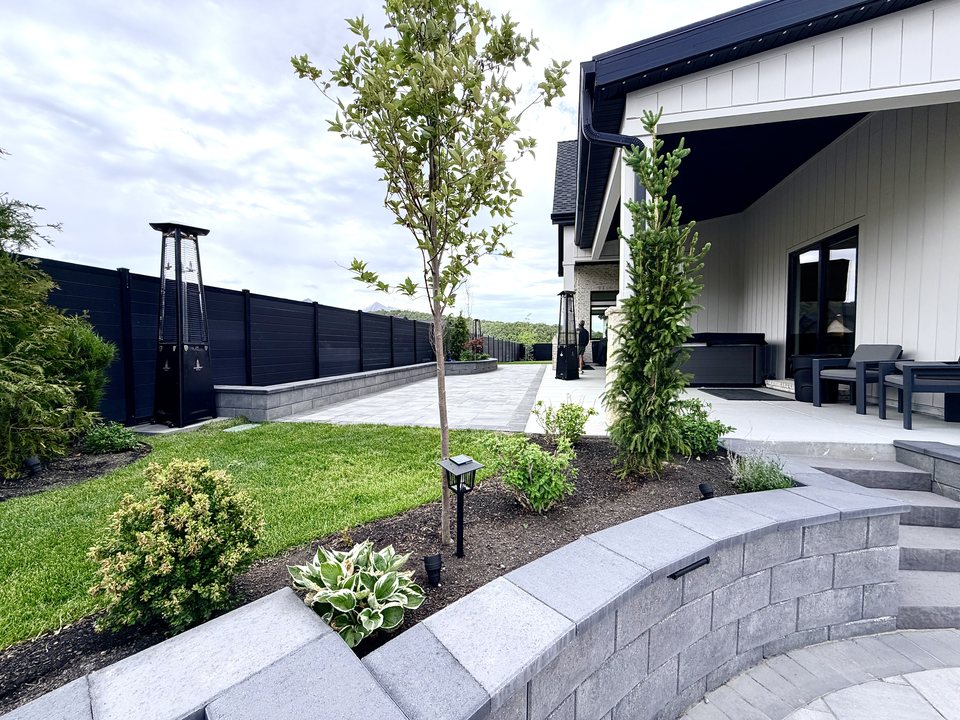Tiered paver walkway with new landscape planting