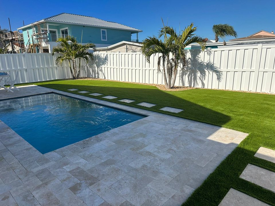 Poolside artificial turf lawn at a Florida home