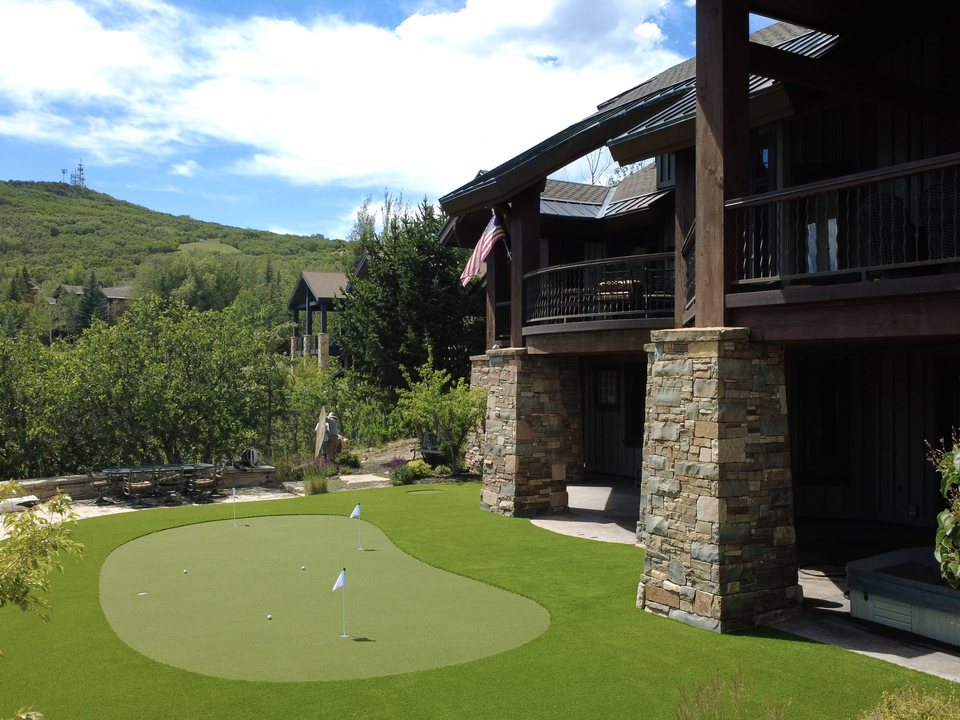Aerial view of a large estate putting green installation